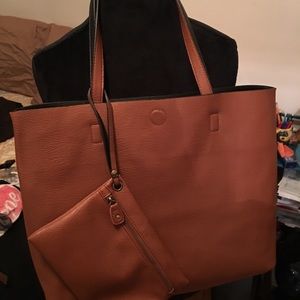 Reversible tote bag with attached wristlet